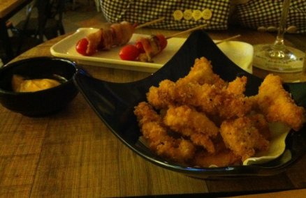 Bacon Cherry Bombs ($6) and Breaded Coq Strips ($6) at Coq & Balls