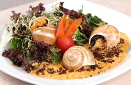 The Garden of Baked Escargots with Tian of Cherry Tomatoes and Potatoes Sand