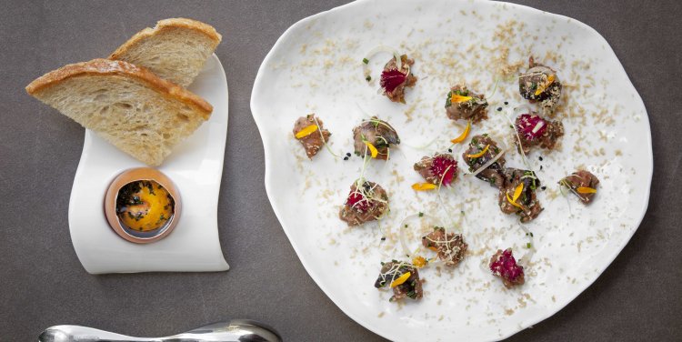 Beef Tartare served with Confit Egg Yolk and Toast, Esquina
