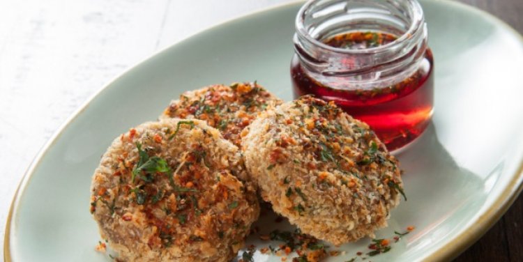 Braised pig head croquettes & quince at Bochinche