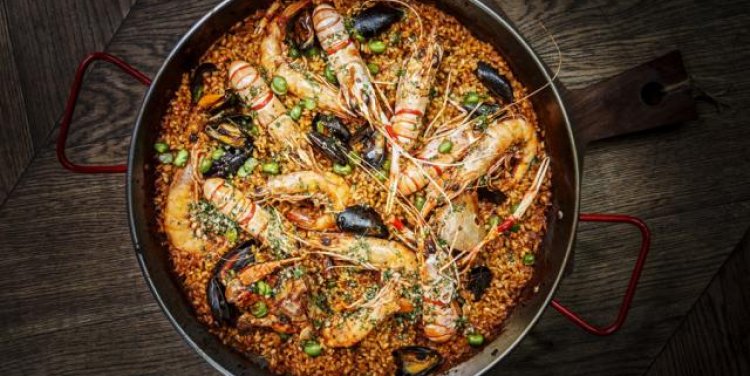 Langoustine, squid & prawns paella
