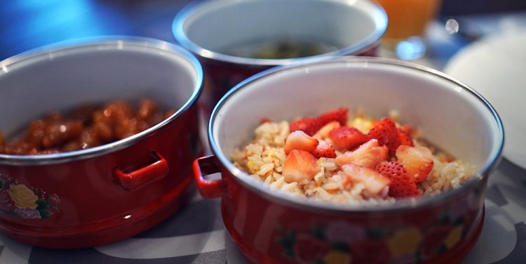 Home-cooked meals packed in an old school tiffin lunch container