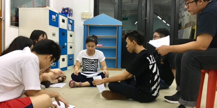 Izzaty and her youth leaders during rehearsals