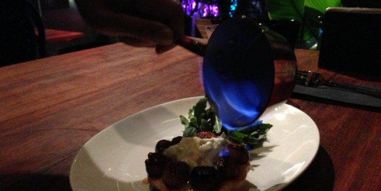 Shallot tarte tatin flamed with amaretto