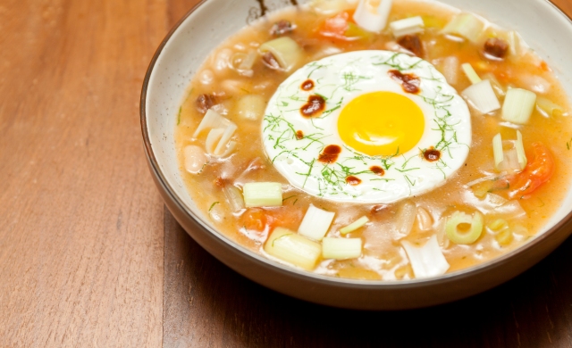 White bean iberico chorizo stew with sunny side up egg