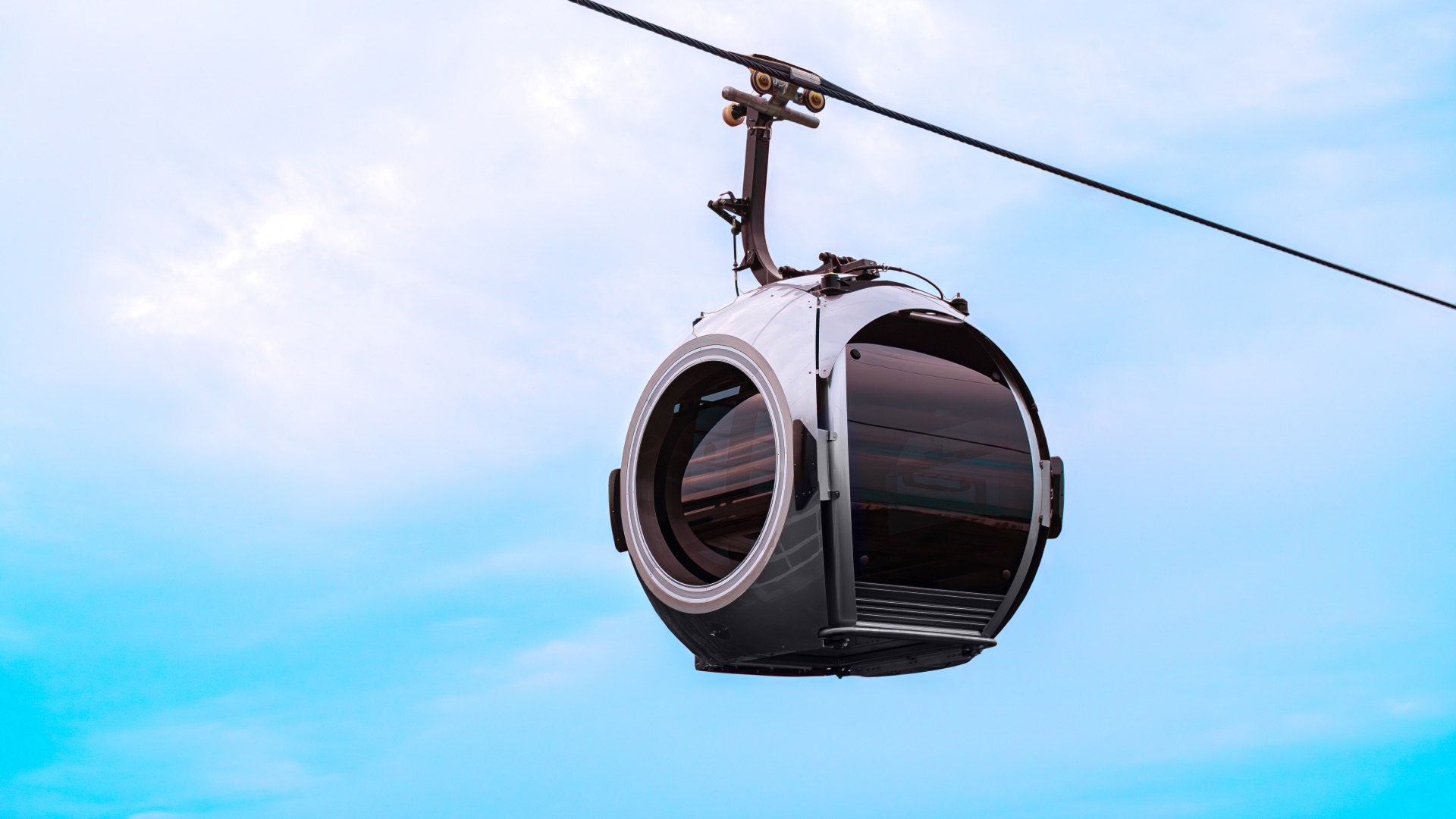 , Singapore Cable Car’s futuristic SkyOrb Cabins have glass-bottomed floors for a spectacular view